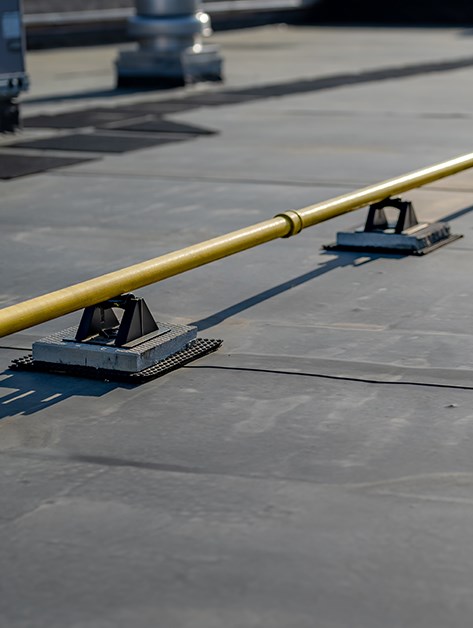 our roofer completing epdm roof maintenance in Rochester, NY