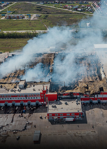 Fire damage on flat industrial roof