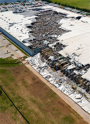 Commercial roof damaged by heavy wind from storm